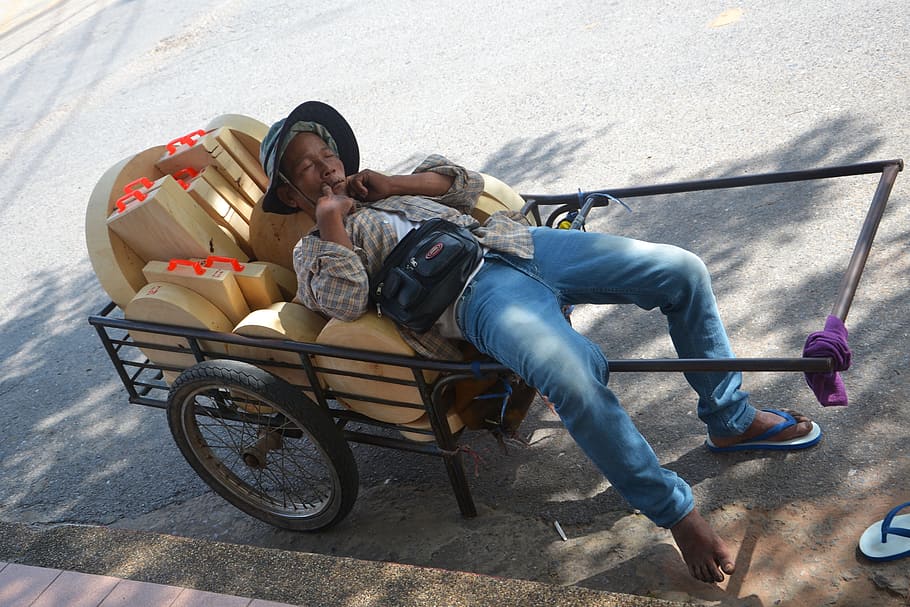 man lying on cart outdoors, sleeping, napping, tired, bed, relax HD wallpaper