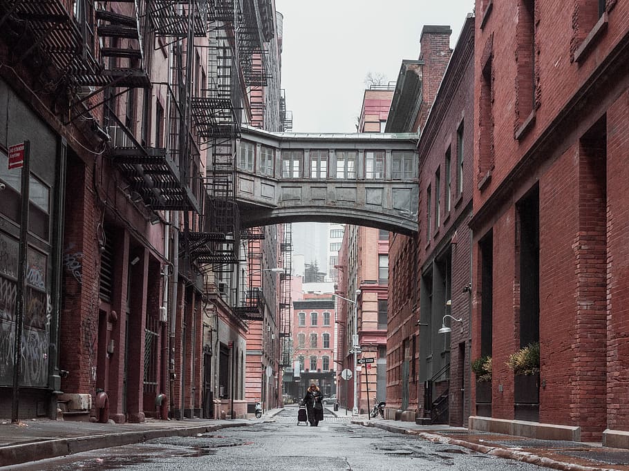 person walking on streets during daytime, urban, bridge, architecture