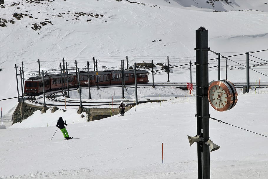 man playing snow skis near train railway, zermatt, winter, cold HD wallpaper