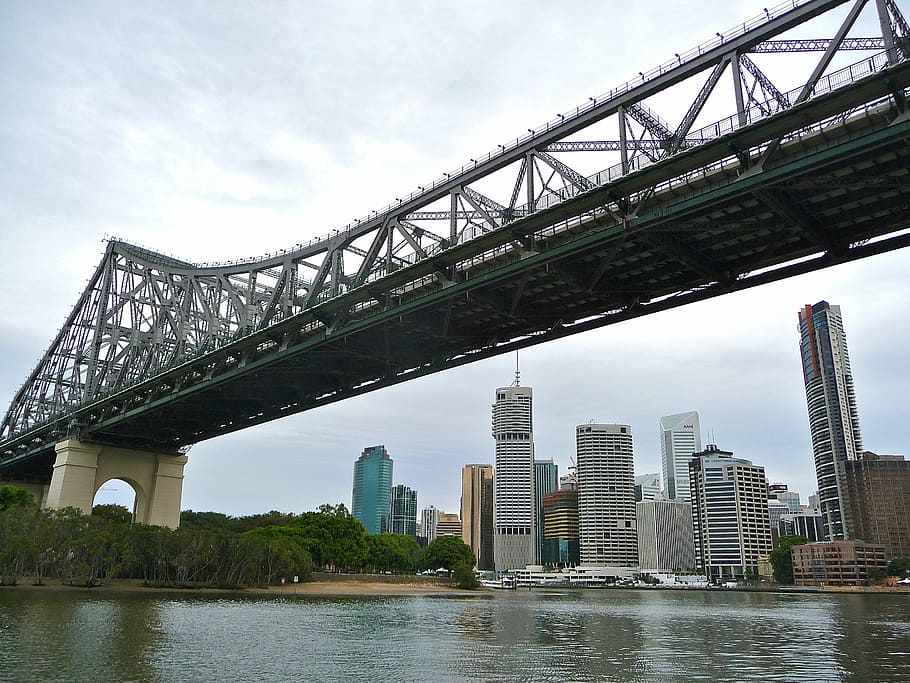low-angle photography of metal bridge during daytime, storey HD wallpaper