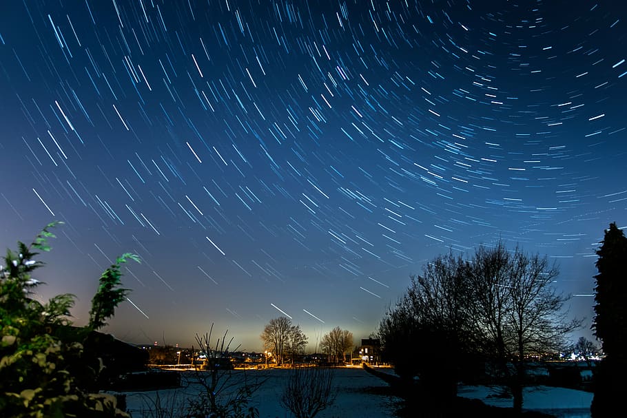 timelapse photo of night sky with stars, startrails, long exposure