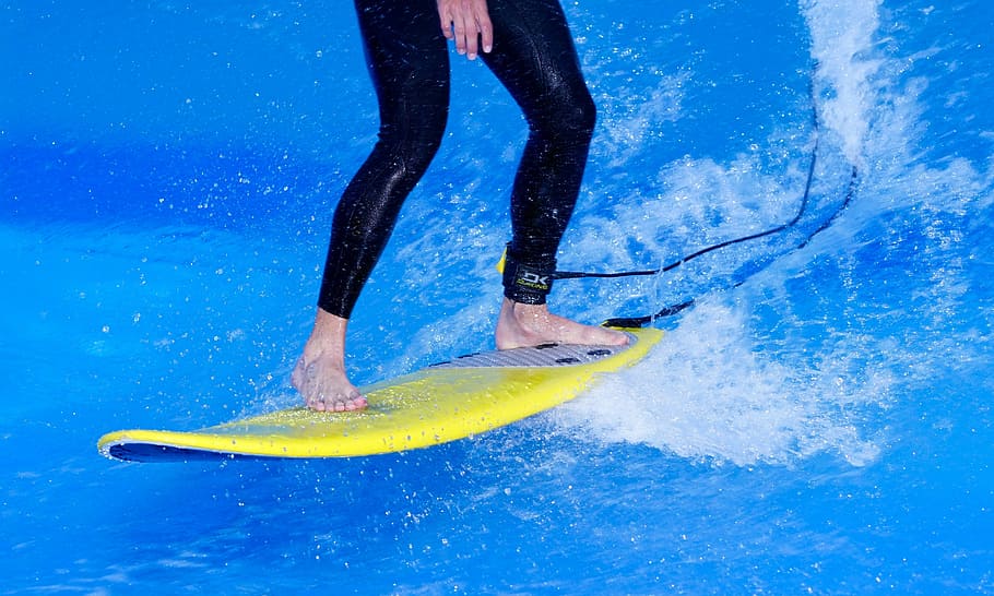person surfing on yellow surfboard, courage, skill, balance HD wallpaper