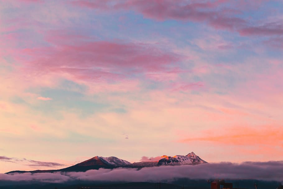 aerial photography of mountain under clouds during golden hour, mountain covered with clouds HD wallpaper