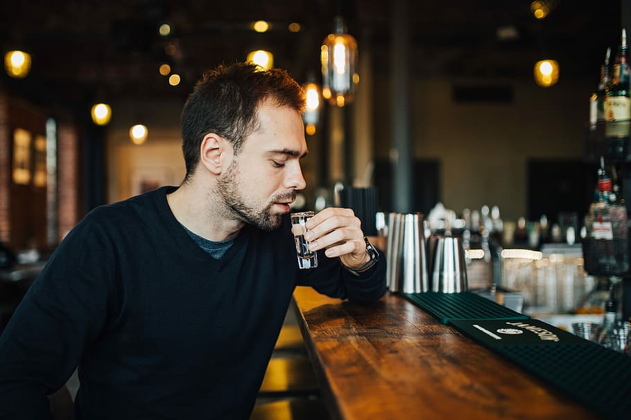 Handsome young man in a pub, adult, drink, male, restaurant, bar