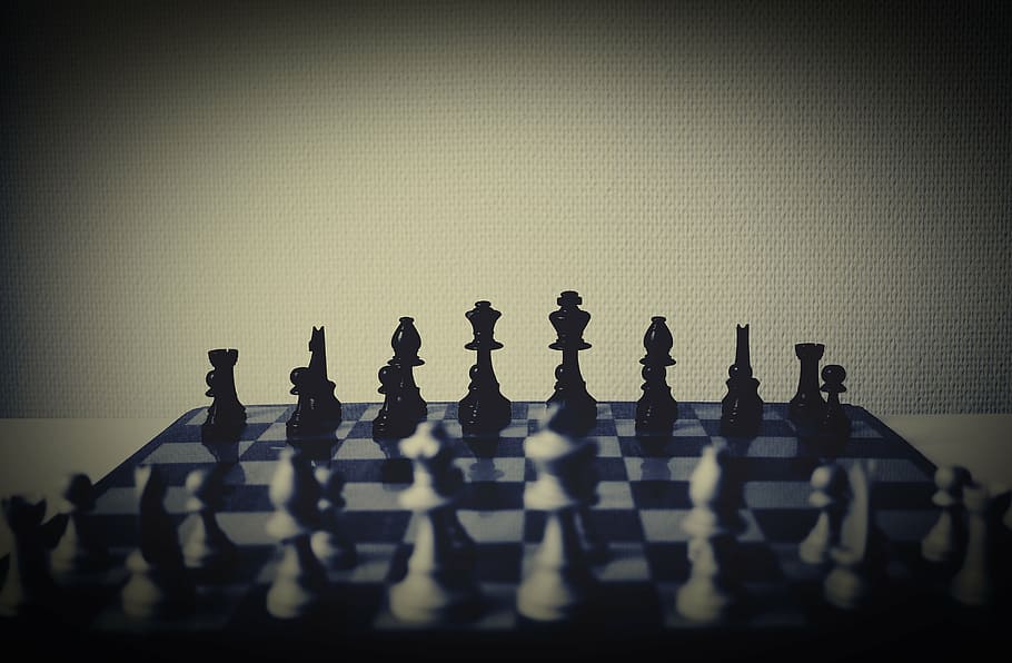 tilt shift lens photo of white and red chess set, selective, focus