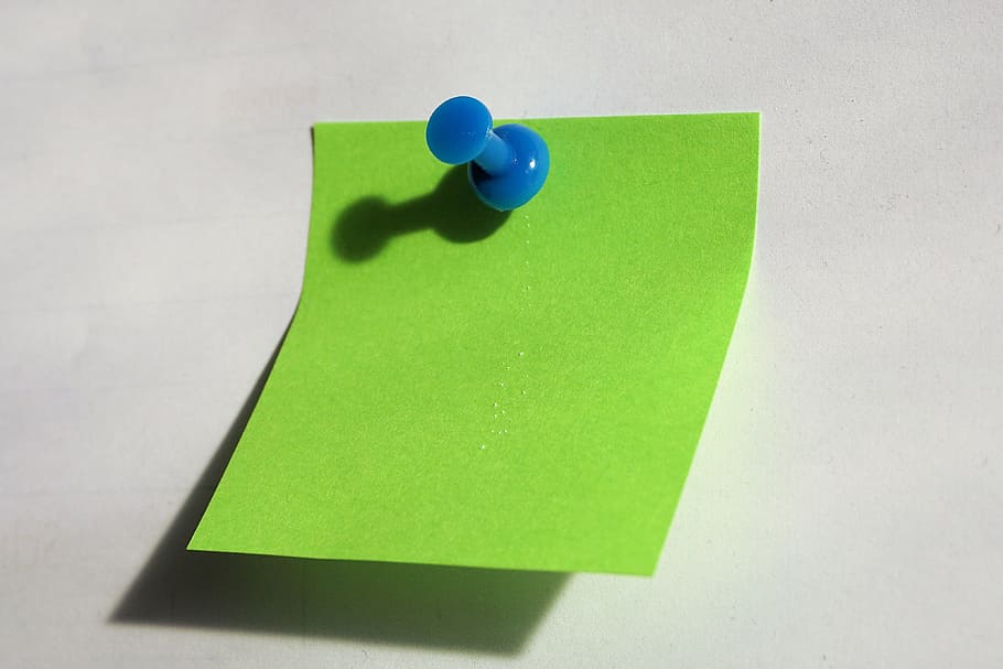 green sticky note pinned with push pin, blue, paper, post it