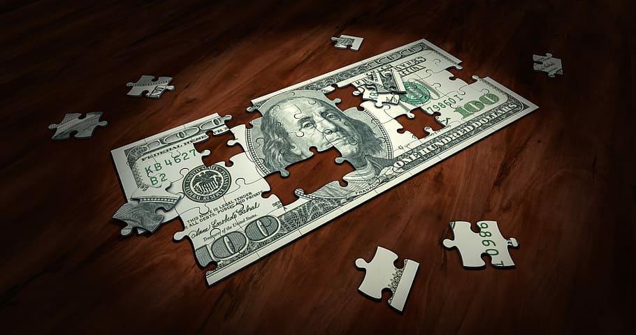 100 U.S. dollar bill puzzle on wooden surface, Money, Business, Finance