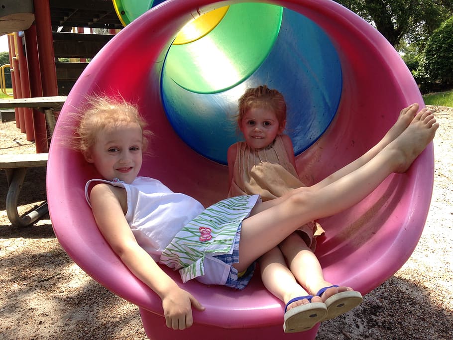 two girls inside tunnel slide, park, playground, summer, outdoor HD wallpaper