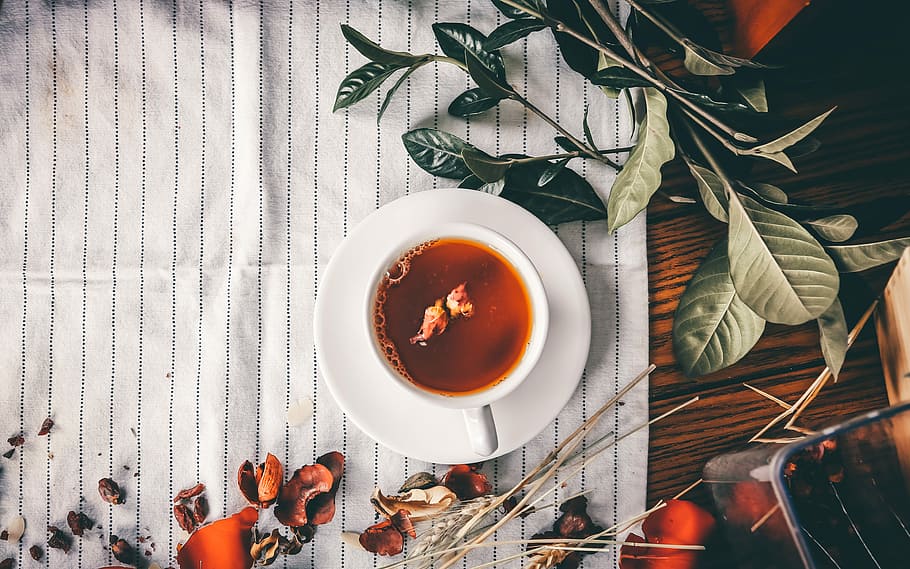 tea serve on white teacup, brown liquid on white ceramic teacup and saucer HD wallpaper