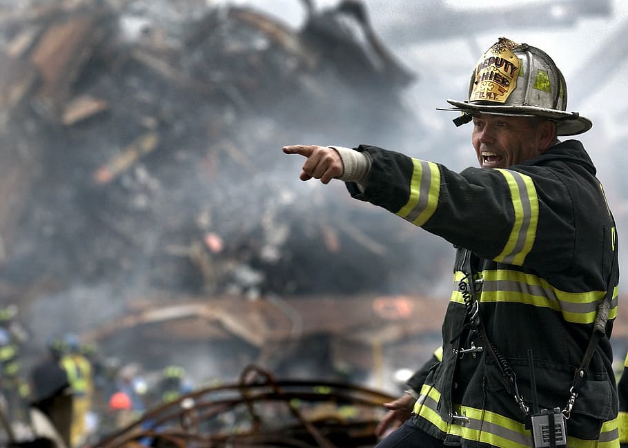 firefighter pointing, fireman, rubble, 9 11, disaster, terrorist attack