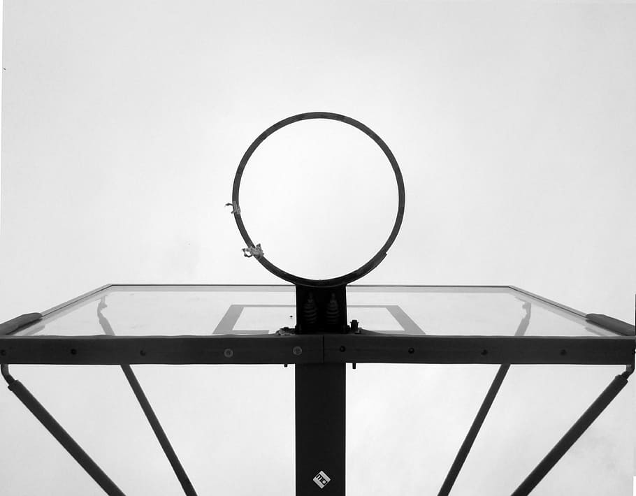 Basketball with no basket lol, black framed clear glass table