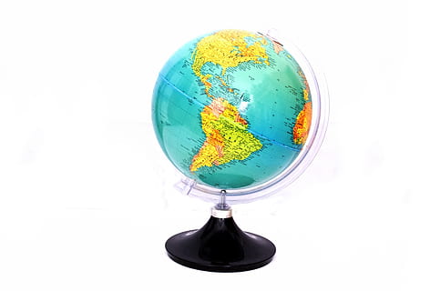 green and black desk globe on white surface, world, atlas, map HD wallpaper