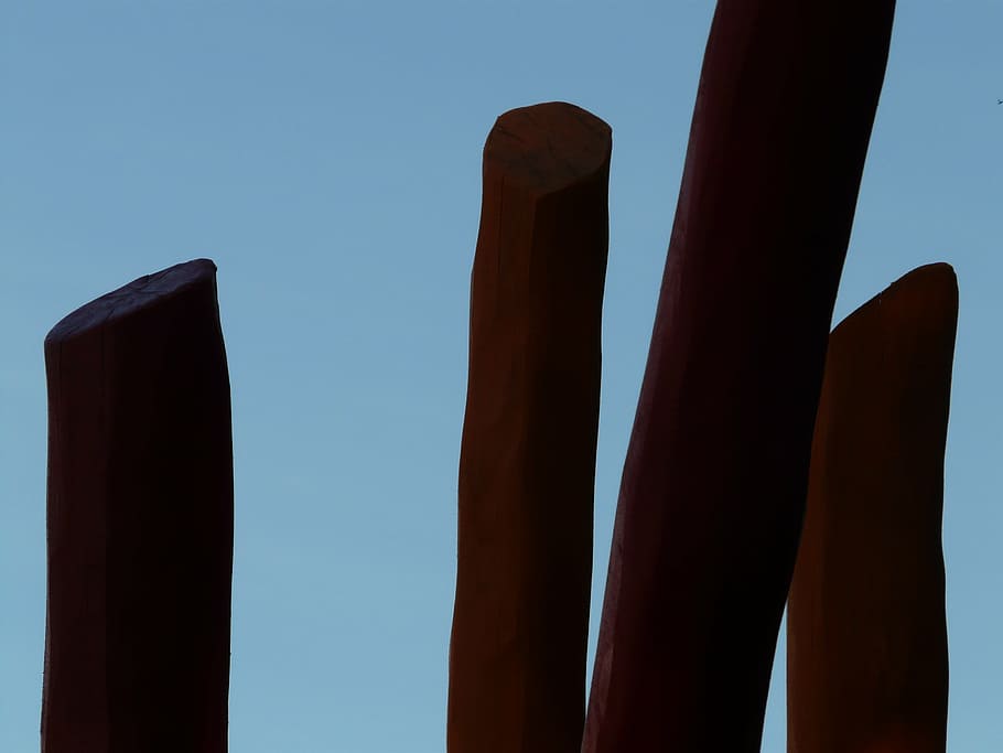 rods, wood, back light, pile, tribe, log, sky, no people, clear sky HD wallpaper