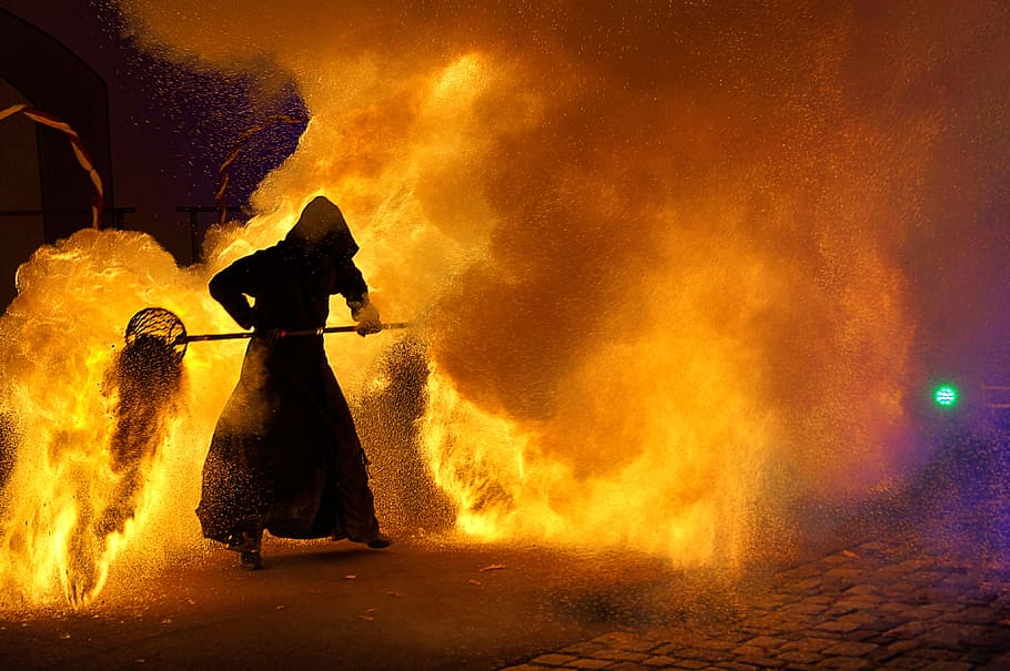 man holding tool near fire, night, light, fireworks, burn, flame