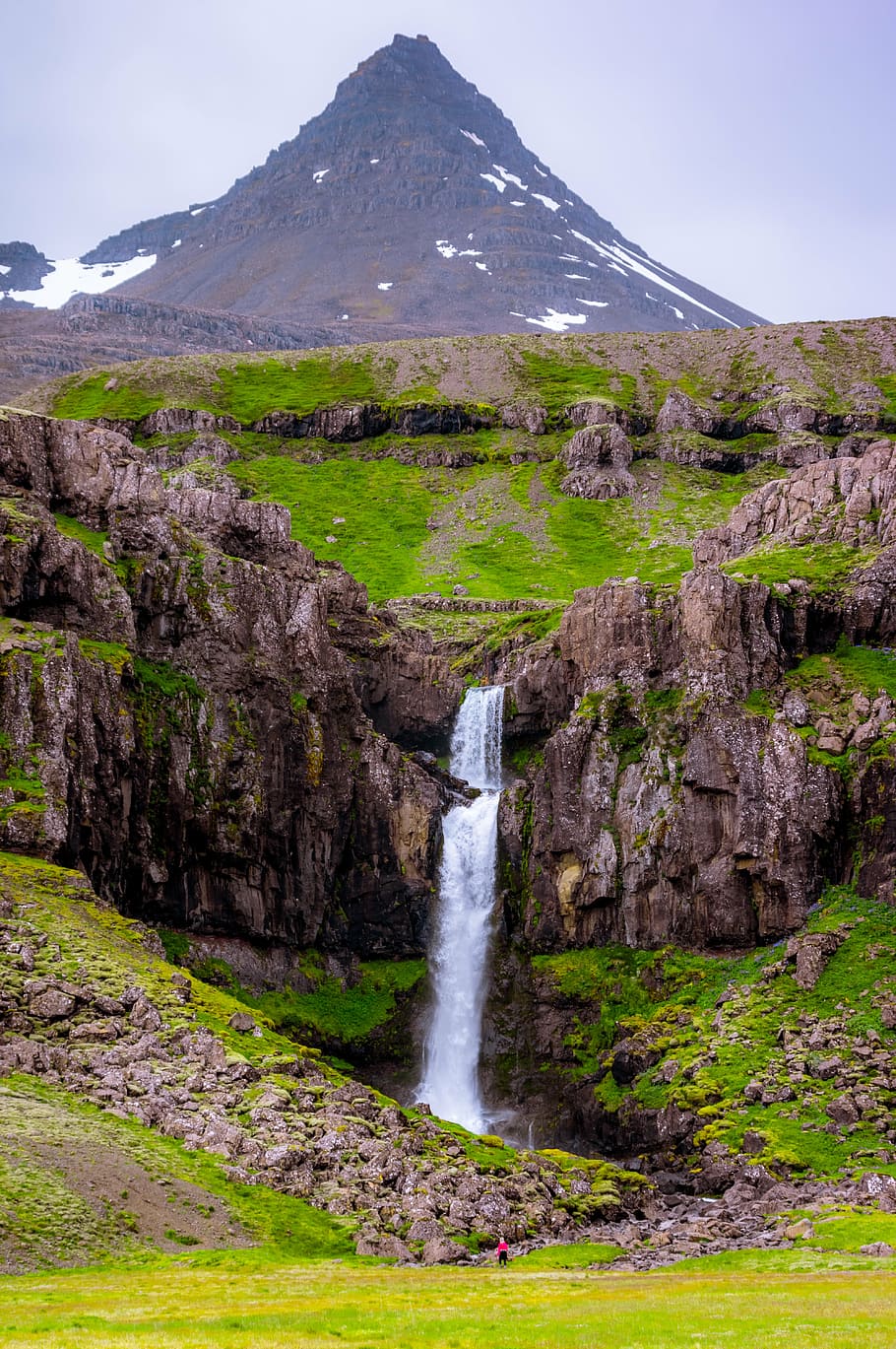 person standing near waterfalls at daytime, nature, green, grass HD wallpaper