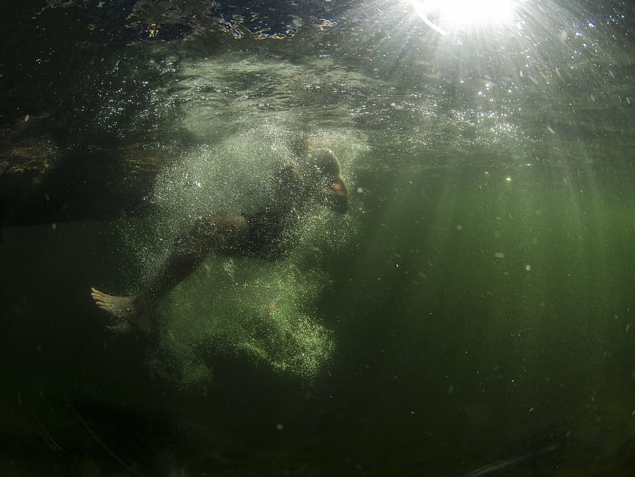 man diving in body of water, person, underwater, jump, bubbles HD wallpaper