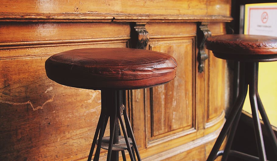 two round brown padded stool chairs, stools, bar, cafe, wood - material HD wallpaper