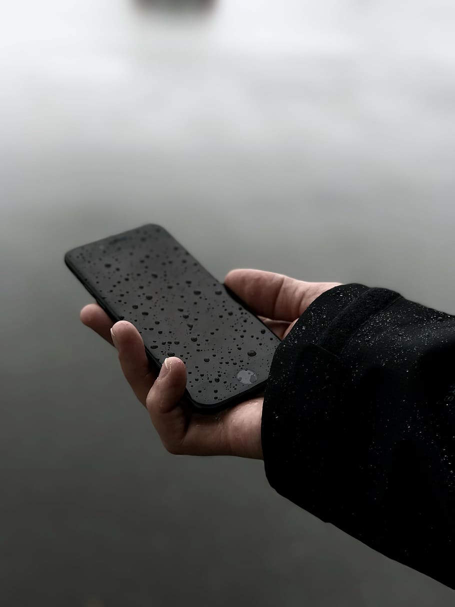 person holding black iPhone 7, apple, hand, macro, mobile phone HD wallpaper