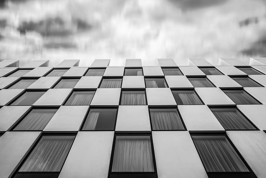 grayscle photo of high rise building, white and black concrete building HD wallpaper