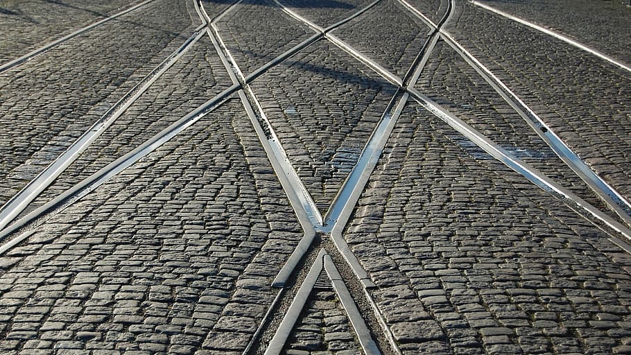 gray train rails, landscape photography of brick flooring with canal HD wallpaper