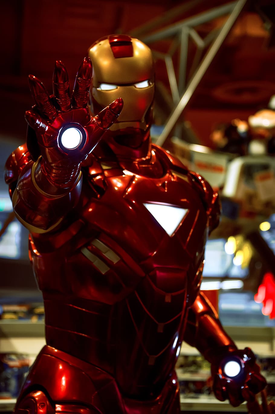 Iron Man statue, ironman, hero, comic, focus on foreground, illuminated