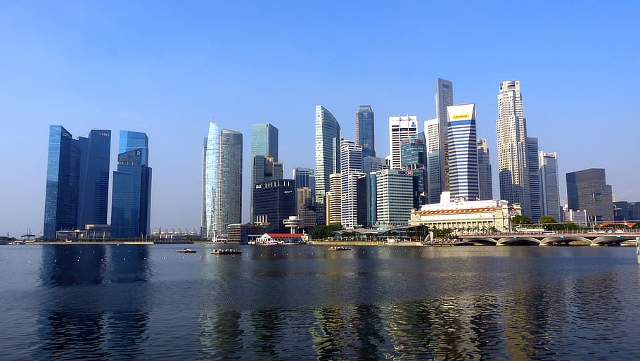buildings near body of water under clear sky, photography, cityscape HD wallpaper