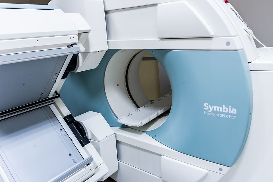 white and blue Symbia magnetic resonance imaging machine, mri