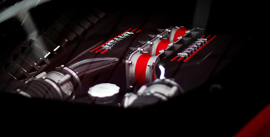 selective focus photo of a vehicle engine, ferrari 458 speciale