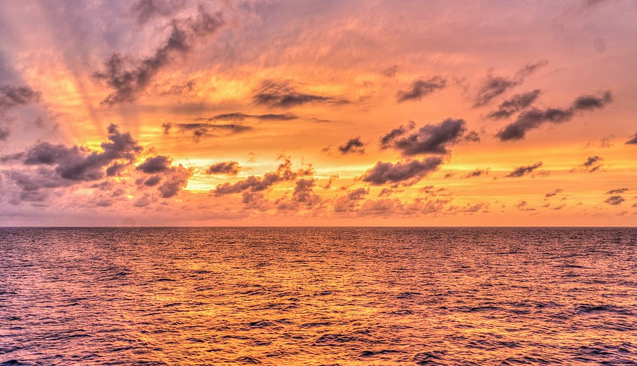 sea under gray clouds at golden hour, sunset, reflection, nature HD wallpaper