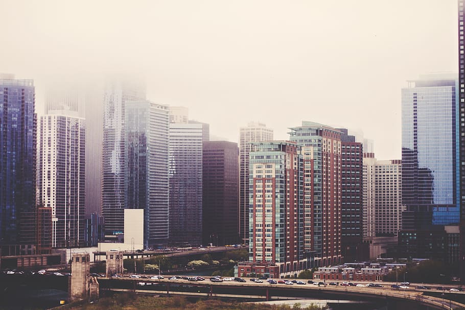 aerial photography of high-rise buildings, concrete buildings under sky at daytime HD wallpaper