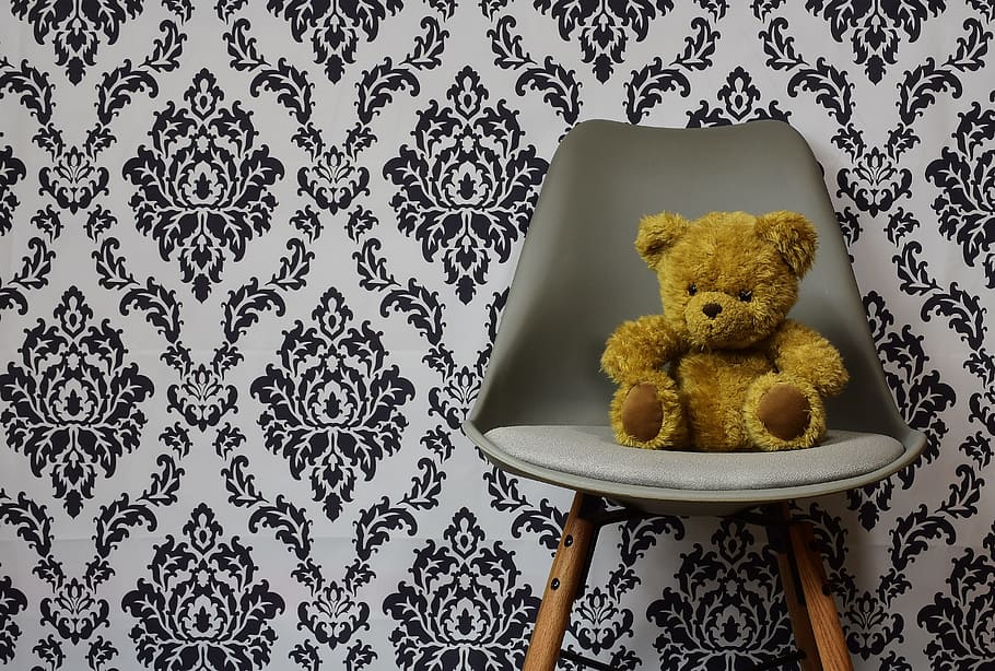 brown bear on chair beside wall, teddy, background, pattern HD wallpaper