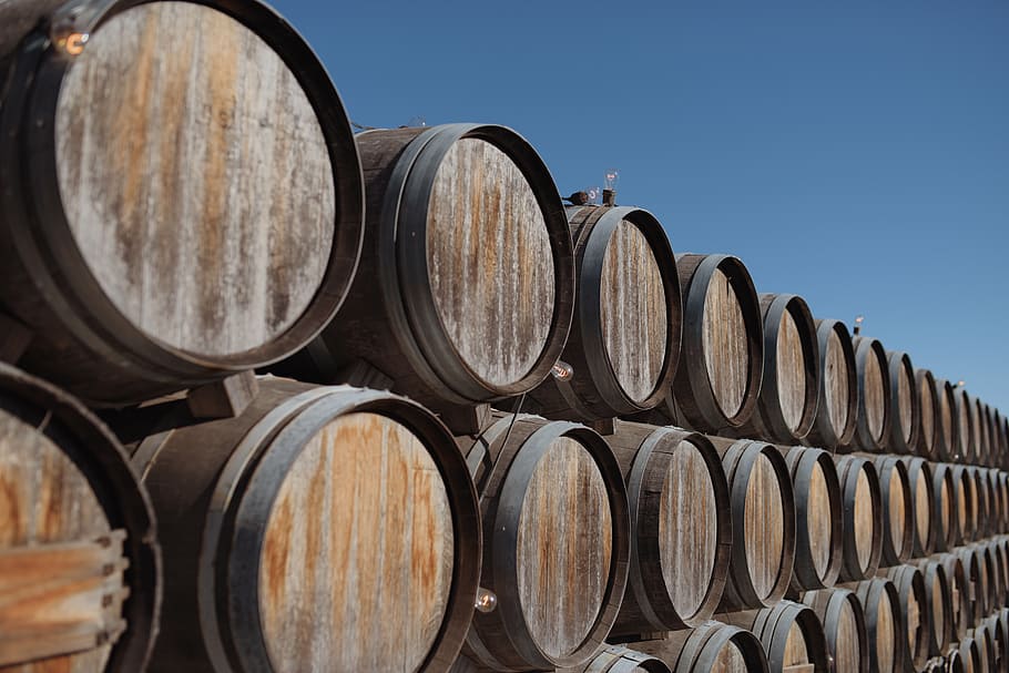 brown wooden beer keg lot, barrels, wine cask, wine cellar, winery