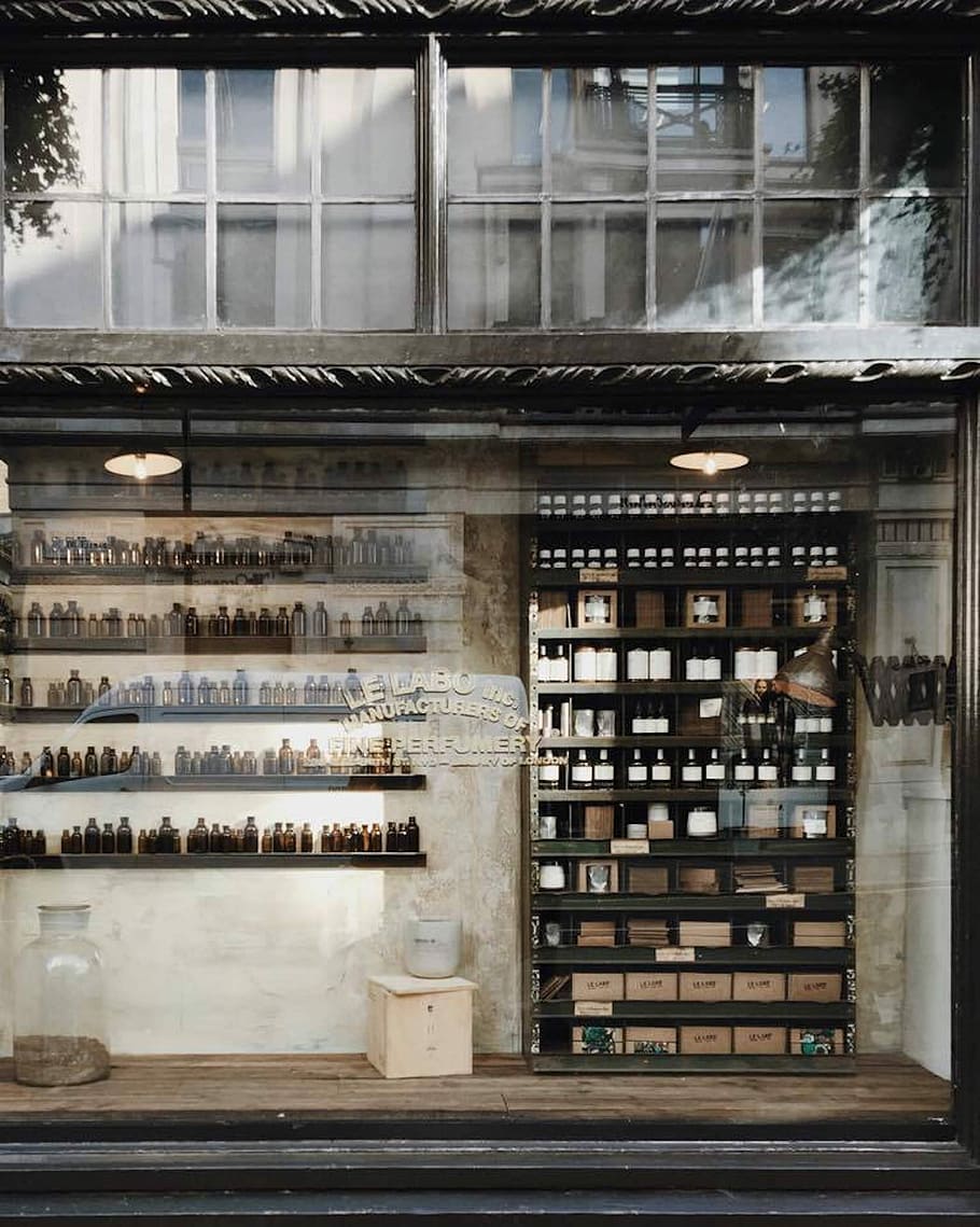 photo of Le Laro store, brown wooden shelf with bottles and boxes photo HD wallpaper
