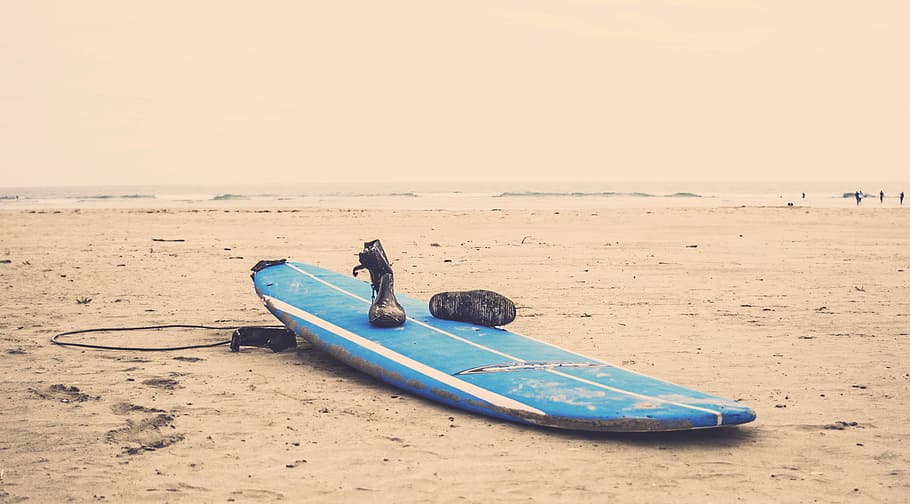 blue surfboard on gray sand, blue surfboard with surf shoes, beach HD wallpaper