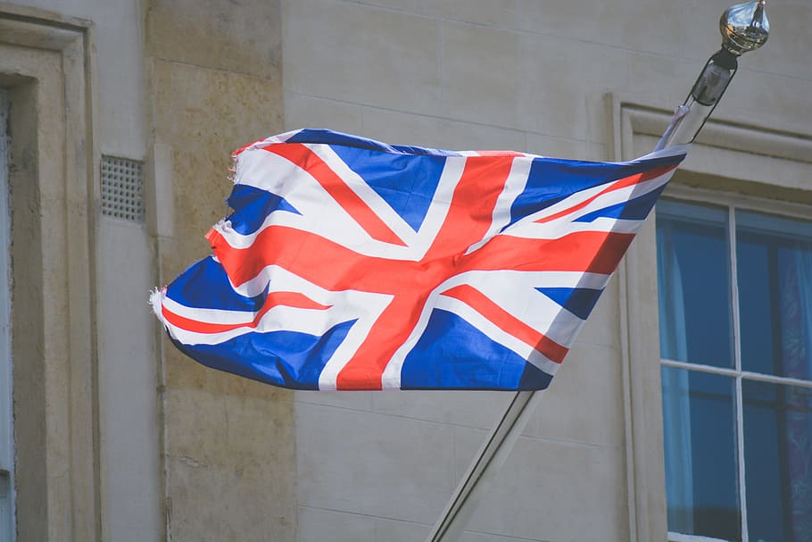 raised United Kingdom flag, England flag on stainless steel pole HD wallpaper