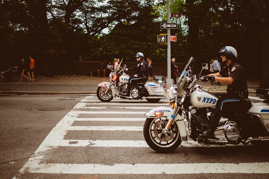 two policemen riding motorcycles on road, two policemen riding motorcycle on pedestrian lane HD wallpaper
