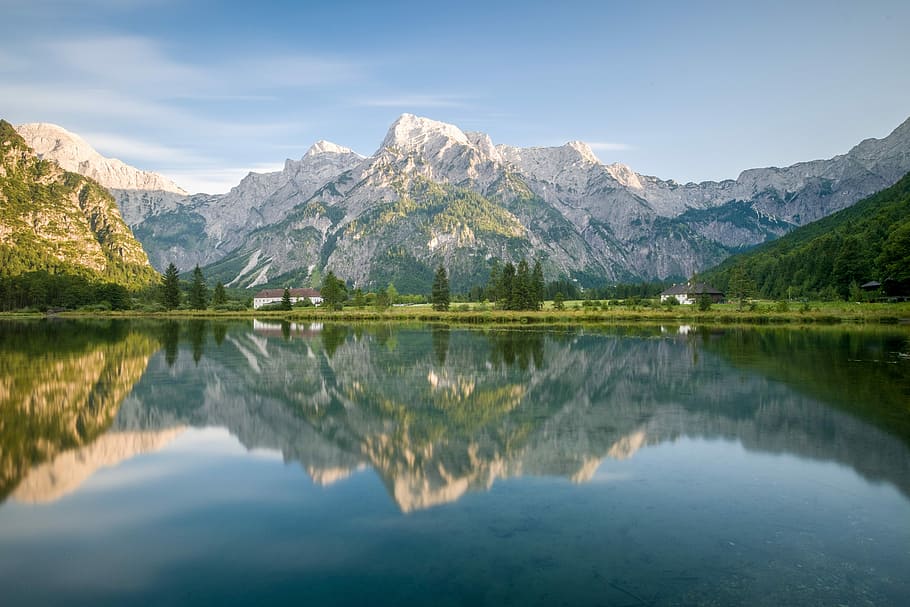photography of trees and body of water under white sky during daytime, landscape photography of mountain surrounded with body of water HD wallpaper