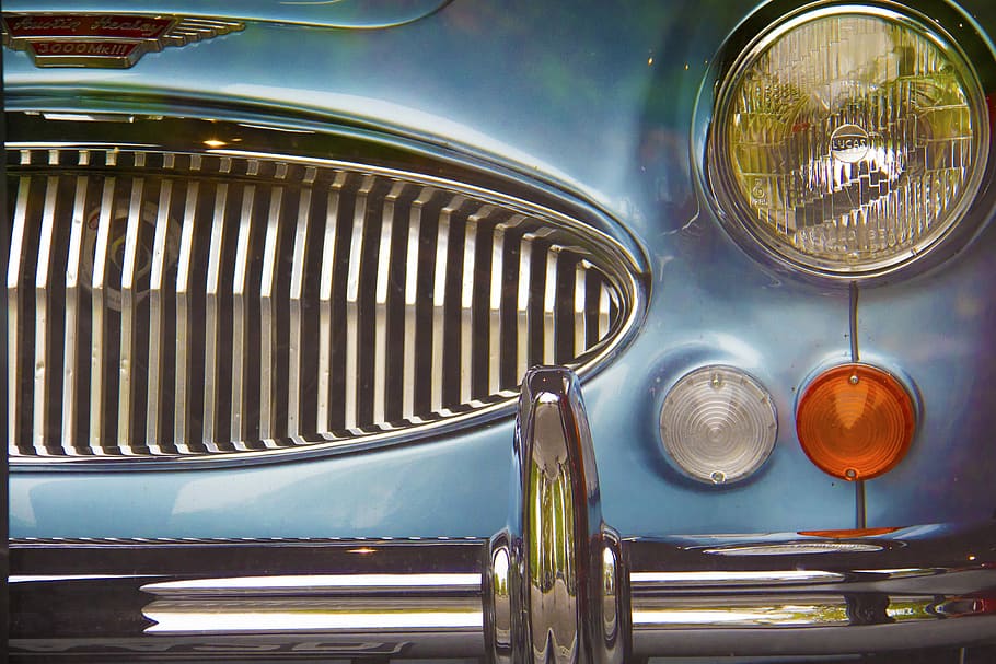 blue car showing grille, classic blue car, headlight, engine