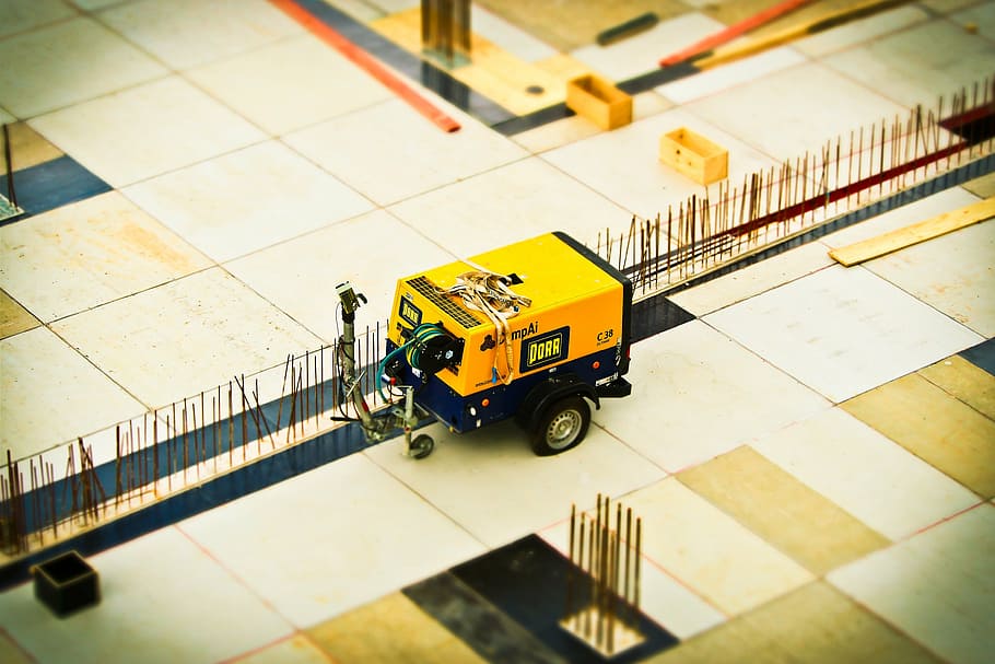 selective focus photography of yellow utility trailer toy, construction HD wallpaper