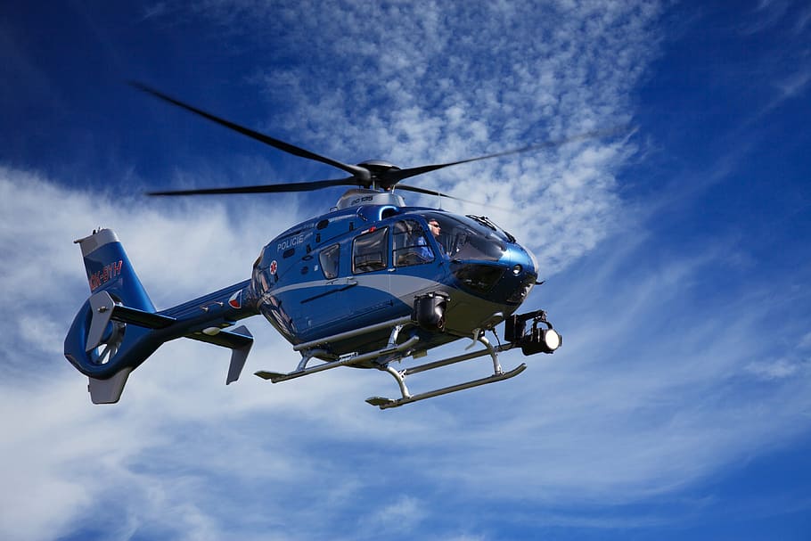 blue and gray helicopter during daytime, action, air, aircraft