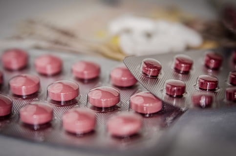 depth of field photography of red blister pack, medications HD wallpaper