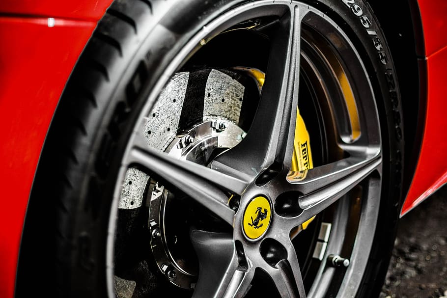 closeup photo of Ferrari wheel, supercar, style, auto, vehicle