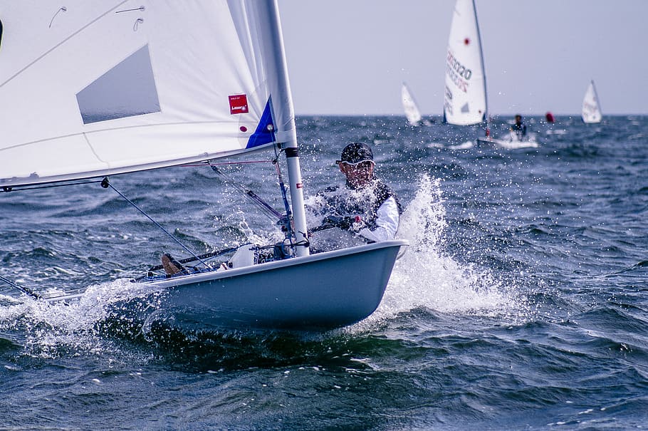 man riding sailboat, person riding on sailing boat, sea, splash HD wallpaper