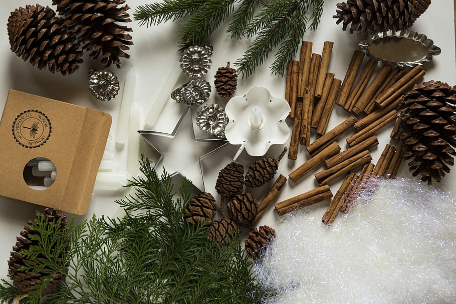 pine cone and cinnamon stick lot, assorted-color pine cone, star, and stick home decor lot HD wallpaper