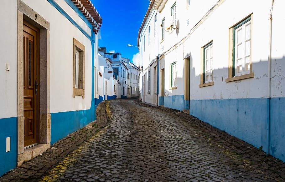 alley photography of brown street between house during daytime, white and blue concrete building HD wallpaper