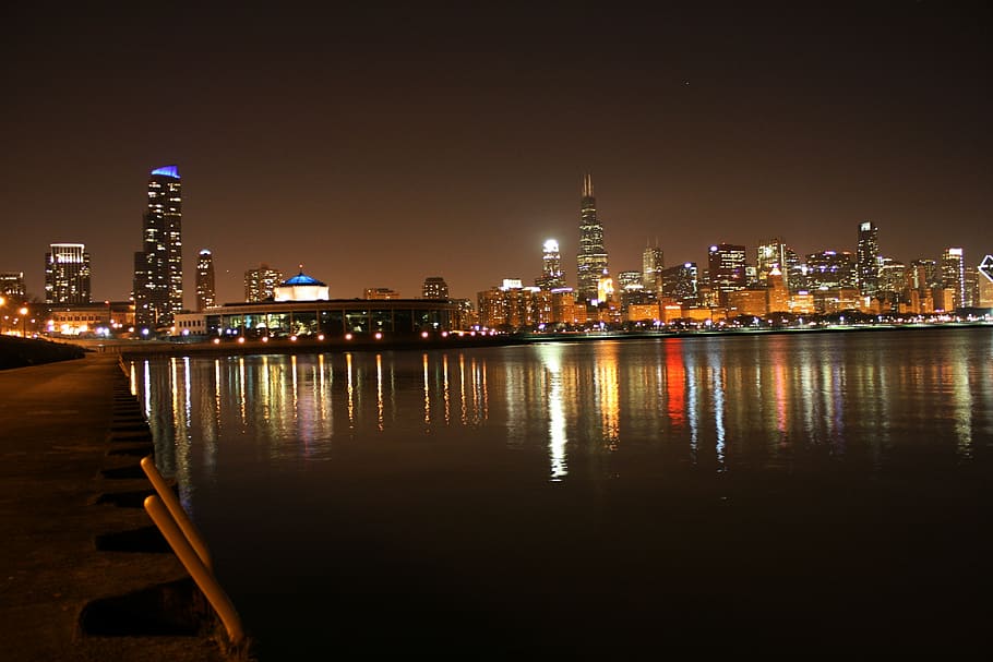 city buildings during nighttime, chicago night, lake michicagn