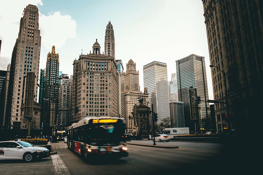 bus passing on road near high-rise buildings, architecture HD wallpaper
