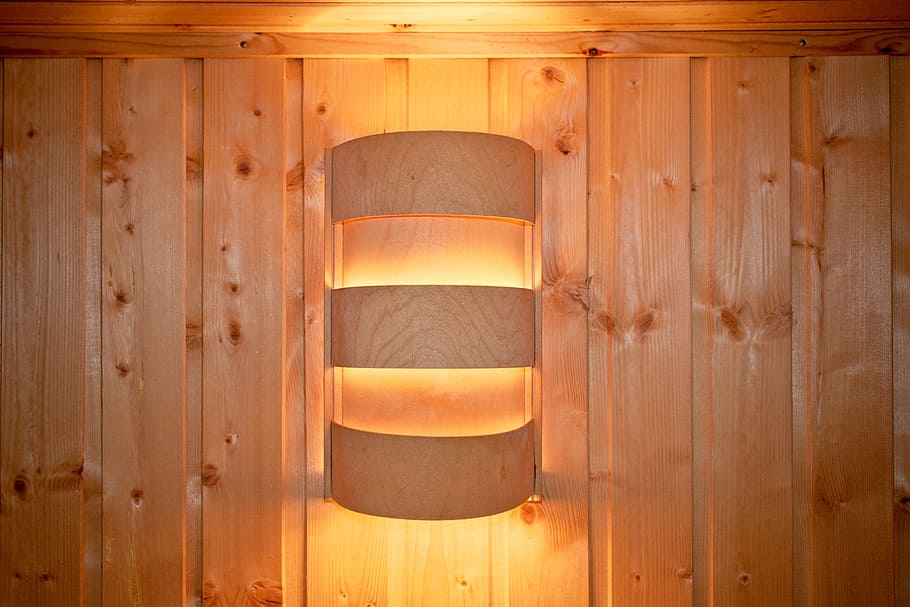 beige lamp mounted on beige wall, light, sauna lamp, wooden wall