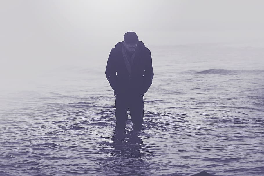A man standing in the ocean water, people, coast, sea, outdoors HD wallpaper