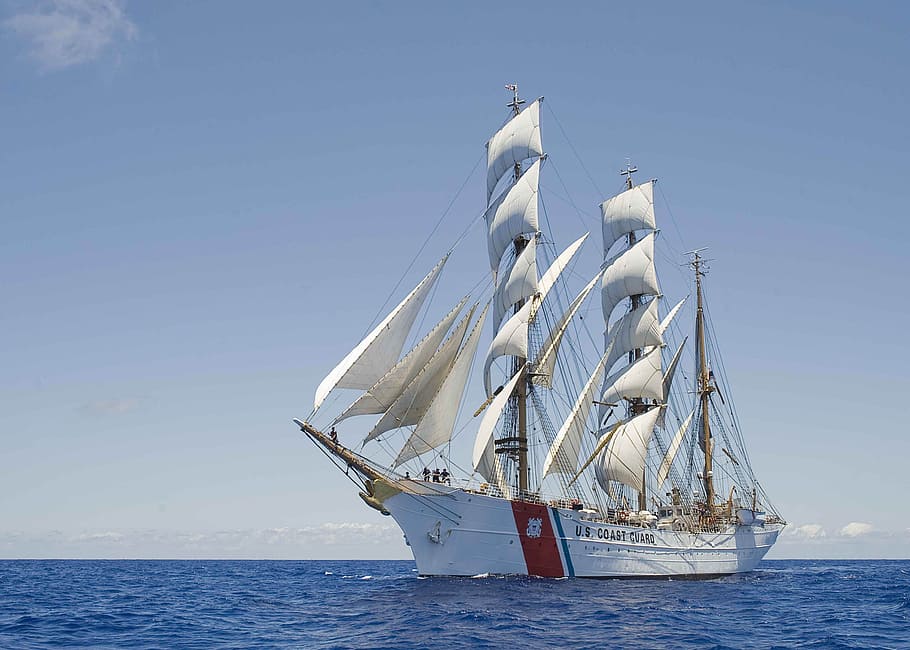white and red galleon ship under blue sky, cutter, three masted
